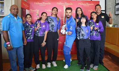 Members and players of the Singapore Cricket Association at the launch of Virat Kohli’s wax figure (Photo: Madame Tussauds Singapore) (PRNewsfoto/Madame Tussauds Singapore)