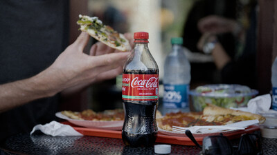 Expansion of Coca-Cola trademark brand in 20-oz 100% recycled plastic* bottles. (PRNewsfoto/Coca-Cola)