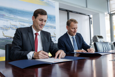 Contract Signing (from left to right): Tobias Meyer, CEO DHL Group; Gene Gebolys, CEO World Energy