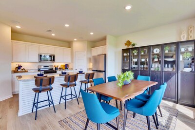 Kendall Floor Plan Dining Area & Kitchen at Trinity Ranch | New Construction Homes in Elgin, TX by Century Communities