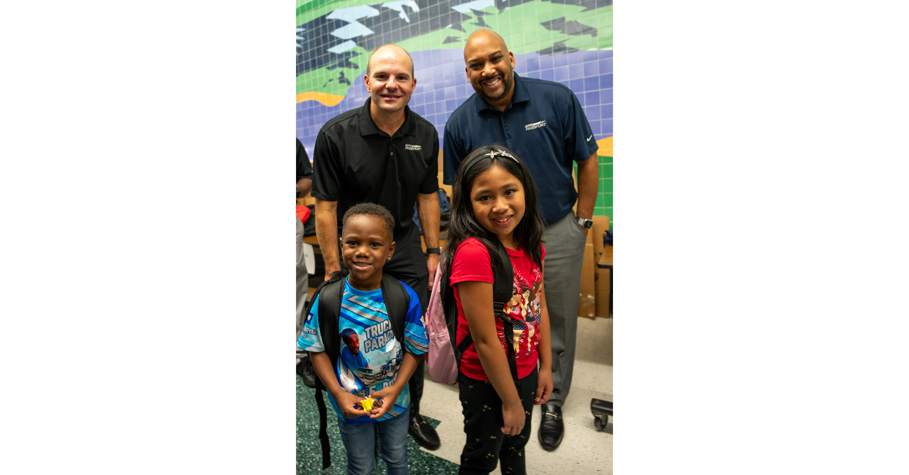 Passport Auto Group Donates 400 Backpacks Through Kids in Need Foundation