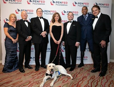 PenFed Foundation leadership with Night of Heroes Gala honorees. Pictured left to right: Allied Solutions CEO Pete Hilger and his wife Debbie, New England Patriots Head Coach Bill Belichick, Emcee and PenFed Foundation President Andrea McCarren and service dog Nigel, PenFed Credit Union President/CEO and PenFed Foundation CEO James Schenck, U.S. Army Master Sgt. (Ret.) Cedric King, and Baseball Legend Tony La Russa.
