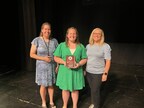 Innovate Albion Executive Director Caroline Hurteau (center) receives the ‘Friend of the Youth Award” from the Marshall Public School Teachers Association.