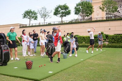 Professional golfer Minjee Lee, Lydia Ko, Minwoo Lee, and Collin Morikawa mentor local junior golfers from the Macau Junior Golf Association during the Sands Golf Day event Monday at the Front Lawn (between The Parisian Macao and the Four Seasons Hotel Macao Cotai Strip). (PRNewsfoto/Sands China Ltd.)