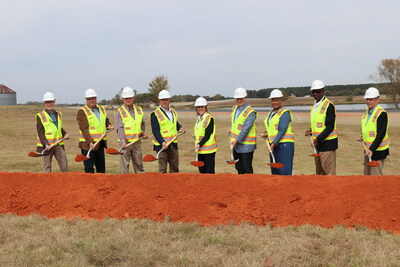 Event speakers participate in the groundbreaking ceremony.