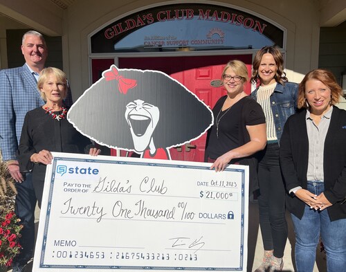 State presents donation check to Gilda's Club