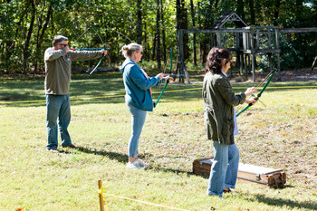 Guests practice hitting a target with a bow and arrow. The activity was hosted by West Tennessee Area Scouts Saturday, Oct. 14, 2023.