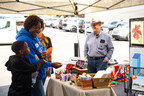 Guests visit with artists at the Art in the Village at the Casey Jones Village Festival Saturday, Oct. 14, 2023.