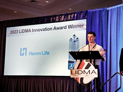 Russ Barrnett, Head of Relationship Management at Haven Life, accepts the 2023 LIDMA award.