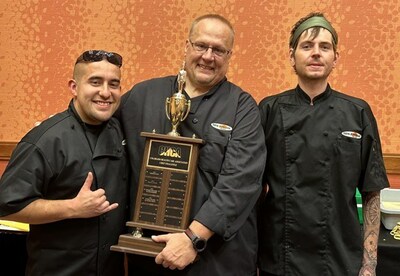 CHCA 2023 Chef Challenge winners Nick Provencio, Jeff Gilchrist, and Kevin Crooks savoring their victory. The three are employed by New Horizon Foods (www.newhorizonfoods.com), foodservice management providers at Keystone Place Legacy Ridge and many other senior communities from Colorado to Connecticut.