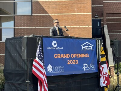 Tope Lala, partner of Solar Energy World, Pure Finance Group, Installation Services, and Homefix Custom Remodeling, giving a speech during the Grand Opening in Laurel, MD.