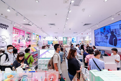 Customers exploring the treasure hunt shopping experience at MINISO's TKO Plaza new store
