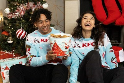 Starting today, fans can get finger lickin’ festive with line of merch inspired by the “Secret Recipe of Joy” holiday bucket at KFCShop.com. The KFC Holiday Collection includes multiple styles to choose from for yourself (or as a gift!) including sweaters, hoodies, hats, bags and more.