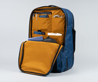 Front compartment separates frequently-accessed travel items from clothing and mobile office areas