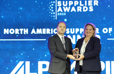 President and CEO of Alps Alpine North America, Robert Hill, accepts the North American Supplier of the Year award.