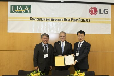 LG Electronics North America CEO Thomas Yoon, University of Alaska Chancellor Sean Parnell and James Lee, global president of the LG Electronics Air Solutions business unit, solidify a partnership to extend research in cold climate heat pumps during a signing ceremony for the Consortium for Advanced Heat Pump Research.