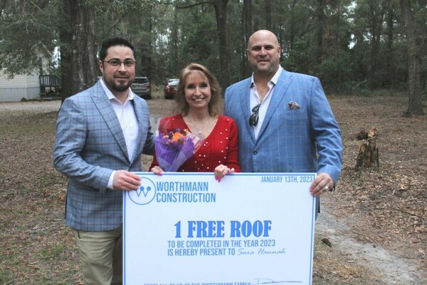 From Left to Right: General Manager, Eli Ott, 2023 Roof Giveaway Winner, Sara Hannah and Owner Drew Worthmann