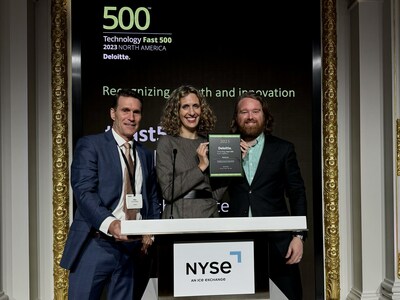 Raistone Chief Financial Officer Mike Bruynesteyn, Chief Strategy Officer Ksusha McCormick, and Director of Marketing Neil Hughes accept the Deloitte Technology Fast 500 award at the New York Stock Exchange on Nov. 7, 2023.
