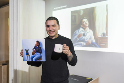 The most followed visual artist, Devon Rodriguez, paints alongside AI-generated art at Blue Bottle Coffee’s “The Human-Generated Art Experiment” in New York City on October 25, 2023. (Ben Hider/AP Images for Blue Bottle Coffee)