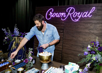 Jordan Davis joins Crown Royal to participate in the Purple Bag Project at The Crown Lounge at the 17th Annual CMA Awards.