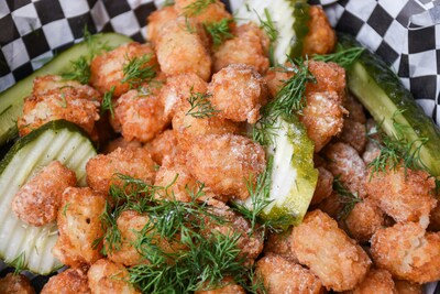 Fuchs North America introduces the Fried & True Collection of seasoning blends. Pictured is Pickle Brine Tater Tots featuring our Pickle Brine Seasoning from the new collection.