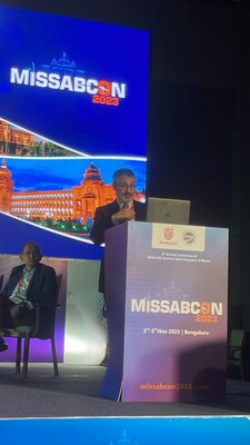 Dr. Hamid Abbasi shown here presenting his groundbreaking Trans Kambin OLLIF technique at the MISSABCON conference in India.