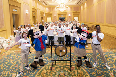 Disney VoluntEARS at Hong Kong Disneyland Resort work with Rise Against Hunger to pack more that 86,000 food packets for the local community.