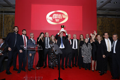 NEW YORK, NEW YORK - NOVEMBER 16: Josè Eduardo Dominicale holds up his Best of the Best Award onstage during the 2023 Ernesto Illy International Coffee Awards on November 16, 2023 at the New York Public Library in New York City. (Photo by Rob Kim/Getty Images for illy)