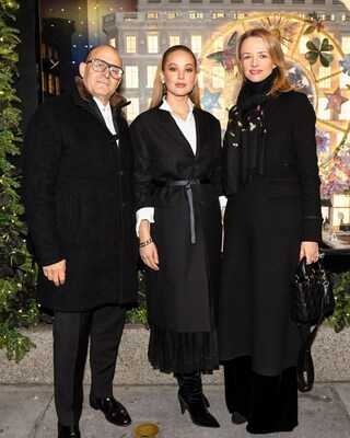 Marc Metrick, Jennifer Lawrence and Delphine Arnault at the unveiling of 'Dior's Carousel of Dreams at Saks'
