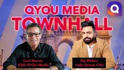 Curt Marvis CEO QYOU Media and Raj Mishra India Group CEO (CNW Group/QYOU Media Inc.)
