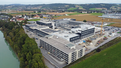 Aerial view of EV Group's corporate headquarters in St. Florian, Austria. In the foreground are the completed Manufacturing IV and V buildings, as well as the Manufacturing VI building, which is under construction. Source: EV Group.