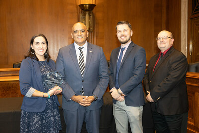 South Jersey Transportation Commission Planning Organization Executive Director Jennifer Marandino and colleagues accept the 2023 National Roadway Safety Award from Federal Highway Administrator Shailan Bhatt.
