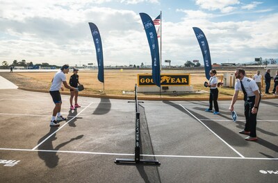 Professional Pickleball Association (PPA) Tour players Catherine Parenteau and Jay Devilliers joined Goodyear Blimp pilots Michael Dougherty and Taylor Deen to play a match on the tarmac with the Goodyear Blimp looking on.
