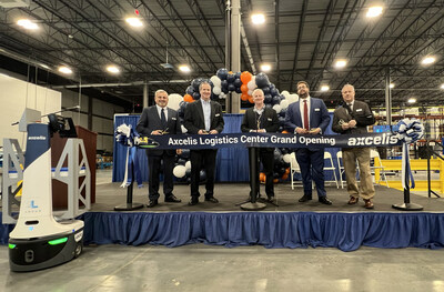 Axcelis Logistics Center grand opening ribbon cutting ceremony. From left to right:  Chris George, Chief Manufacturing Officer; Kevin Brewer, EVP Finance and Manufacturing; Russell Low, President and CEO; Kais Doghri, Director of Operations; Carl Stankiewicz, Director of Operations