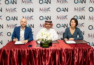 From left to right: Johann Polecsak (Co-Founder and CTO of QANplatform), H.E. Sheikh Mansoor Bin Khalifa Al-Thani (Founder and Chairman of MBK Holding, member of the Qatari ruling family), Jevgenia Kim (CEO of QANplatform)