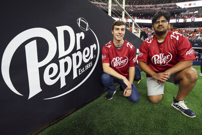 Gavin W. and Ryan G. winners of the Dr Pepper Tuition Toss during halftime at the 2023 Big 12 Championship Game on December 2, 2023, at the AT&T Stadium in Arlington, TX.  (AP Images for Dr Pepper)