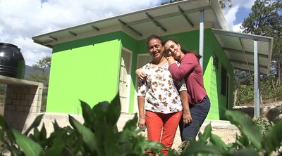 Mayra Carolina and her mother, Maira, partnered with Habitat El Salvador to build their energy-efficient home in La Palma, which they moved into in February 2023