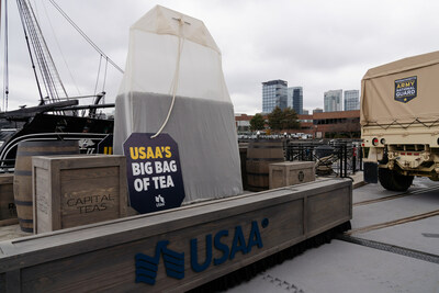 Photo of USAA's 374 pound Big Bag of Tea at the USS Constitution celebrating the 124th Army-Navy Game and 250th anniversary of the Boston Tea Party.