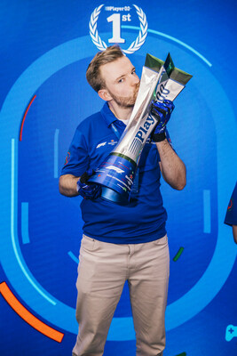 Finalist Floris Wijers of the Netherlands celebrates winning at the global final of Player 0.0 sim racing competition, hosted at the Heineken Experience on December 06, 2023 in Amsterdam