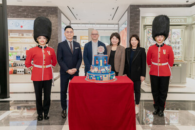 DFS celebrates the store's first anniversary with a lively cake-cutting ceremony.