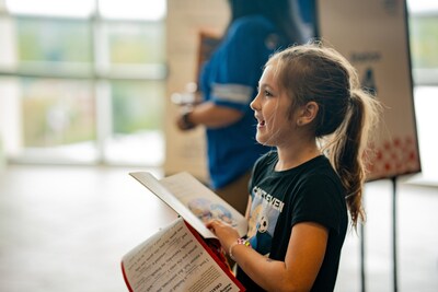 Students participate in literary activities at the New Worlds Reading Initiative