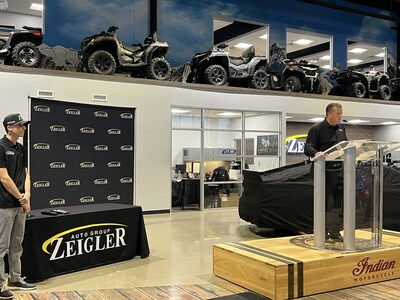 Zeigler President & Owner Aaron J. Zeigler at the podium announcing 2024 Zeigler Racing Partnership with Spire and Hocevar