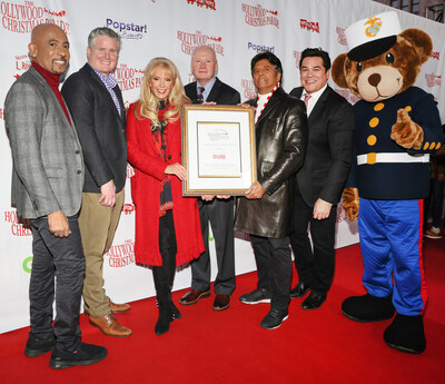 Montel Williams, Chris Cocks (Hasbro CEO), Laura McKenzie, Retired USMC Lieutenant General James B. Laster (President & CEO of the Marine Toys for Tots Foundation), Erik Estrada, Dean Cain, and Gunny Bear at the 91st Anniversary of the Hollywood Christmas Parade.