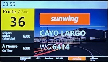 Les clients de Vacances Sunwing partent à bord du premier vol au départ de l'Aéroport international Jean-Lesage de Québec vers Cayo Largo ce matin. (Groupe CNW/Sunwing Vacations Inc.)