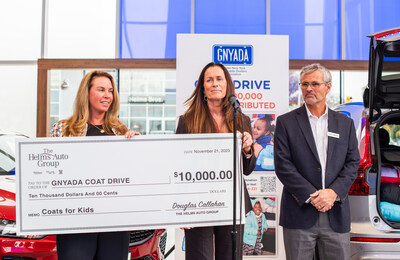 Cars for Coats: The Helms Auto Group Vice Presidents Kirstin Callahan Austin (left) and Sean Callahan (right) joined General Manager Suzanne Cochrane (center) in presenting a check of $10,000 at Volvo Cars of Queens to the 2023 GNYADA Coat Drive for Kids.