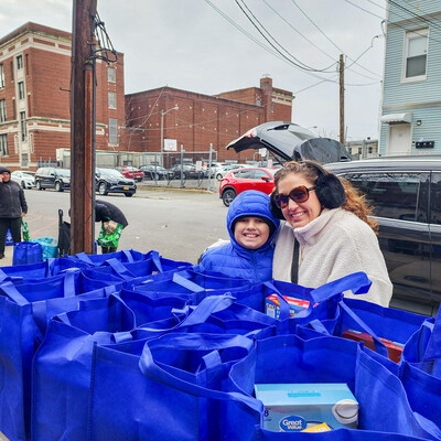 10-year-old Dante Olshefski and his mom, Melissa Olshefski, are overjoyed to help struggling families have more food on their table, especially during the Christmas season.