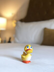 Rubber Ducky on Hotel Bed