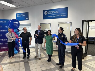 OIAA Commissioner Curt Hagman (second from left), OIAA Board President Alan Wapner (center left), Congresswoman Norma Torres (center right) and Cheryl M. Davies, CBP Director of Field Operations, cut the ribbon to ONT's new Global Entry Enrollment Center.