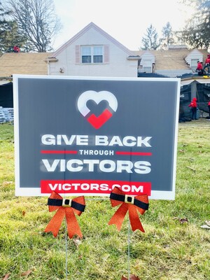 Holiday Give Back sign