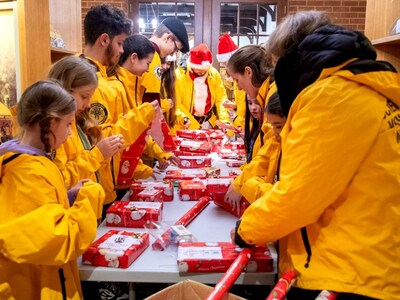 To make Christmas special for kids spending the holidays in hospital, young UK Scientologists decided to collect, wrap and bring them Christmas presents
